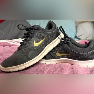 Nike- no longer made old school women’s ORIVE NM black gold sneakers. Size 7